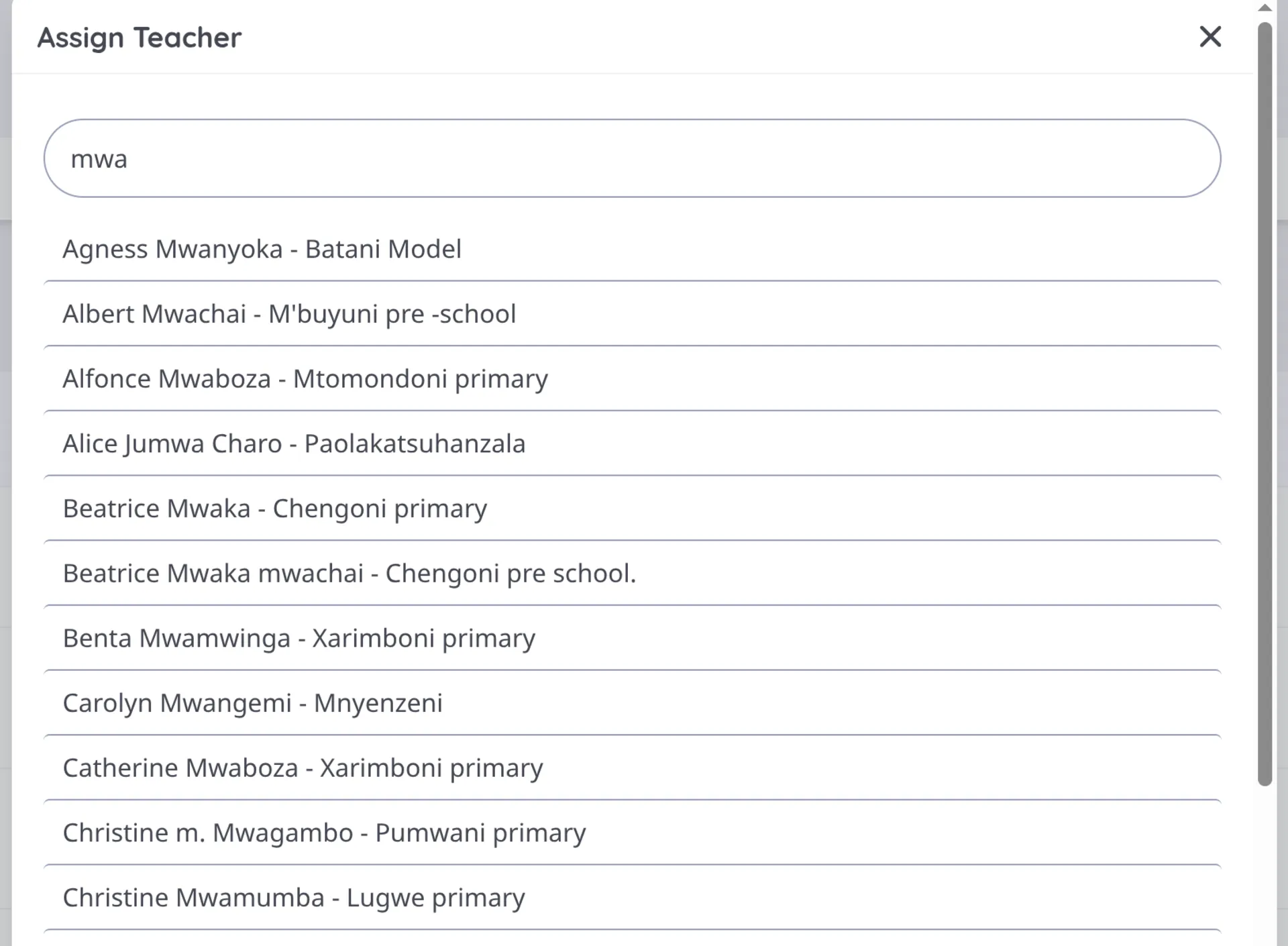 The Assign Teacher modal: a search box with matching teachers listed below it